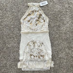 White and gold sequin festival dress